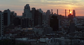 Movie still from “On the Rocks” (2020), directed by Sofia Coppola – A view of a city skyline at sunset; Extreme Wide shot, High angle