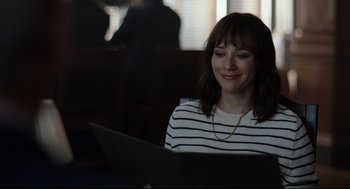 Movie still from “On the Rocks” (2020), directed by Sofia Coppola – A woman in a striped shirt is looking at a piece of paper; Close Up shot, Over the shoulder angle