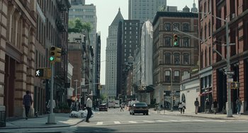 Movie still from “On the Rocks” (2020), directed by Sofia Coppola – A busy city street with cars and people crossing it; Extreme Wide shot, High angle