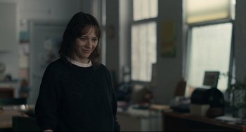 Movie still from “On the Rocks” (2020), directed by Sofia Coppola – A woman standing in front of a window in a room; Medium shot, Over the shoulder angle