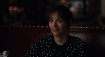 Movie still from “On the Rocks” (2020), directed by Sofia Coppola – A person sitting in a chair; Close Up shot, Over the shoulder angle
