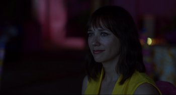 Movie still from “On the Rocks” (2020), directed by Sofia Coppola – A person wearing a yellow shirt; Close Up shot, Over the shoulder angle
