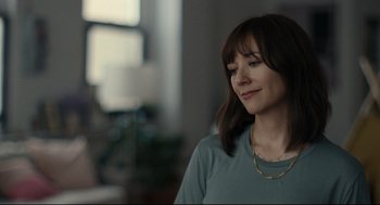 Movie still from “On the Rocks” (2020), directed by Sofia Coppola – A person wearing a necklace; Close Up shot, Over the shoulder angle