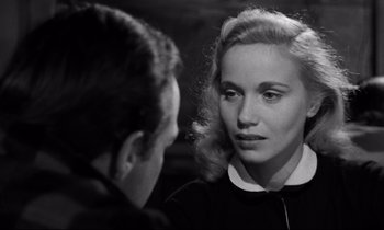 Movie still from “On the Waterfront” (1954), directed by Elia Kazan – A man and a woman looking at one another; Close Up shot, Over the shoulder angle