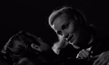Movie still from “On the Waterfront” (1954), directed by Elia Kazan – A man and a woman in a black and white photo; Close Up shot, Low angle