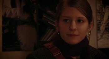 Movie still from “Once” (2007), directed by John Carney – A person wearing a scarf; Close Up shot, Over the shoulder angle
