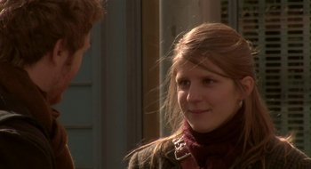 Movie still from “Once” (2007), directed by John Carney – A young woman is talking to a young man outside; Close Up shot, Over the shoulder angle