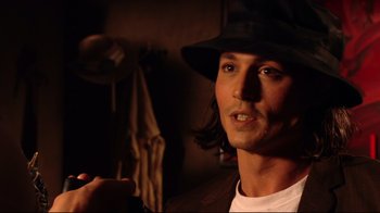 Movie still from “Once Upon a Time in Mexico” (2003), directed by Robert Rodriguez – A person wearing a hat; Close Up shot, High angle