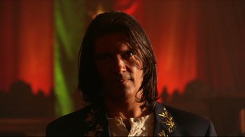 Movie still from “Once Upon a Time in Mexico” (2003), directed by Robert Rodriguez – A person with long hair; Close Up shot, Low angle