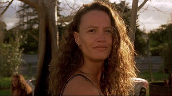 Movie still from “Once Were Warriors” (1994), directed by Lee Tamahori – A person with curly hair; Close Up shot, Low angle