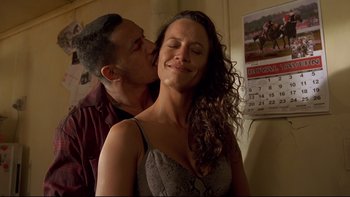 Movie still from “Once Were Warriors” (1994), directed by Lee Tamahori – A man kissing a woman on the cheek; Close Up shot, Low angle