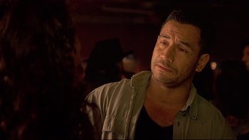 Movie still from “Once Were Warriors” (1994), directed by Lee Tamahori – A person wearing a shirt; Close Up shot, Over the shoulder angle