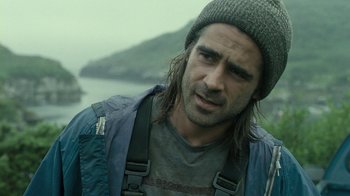 Movie still from “Ondine” (2009), directed by Neil Jordan – A person with long hair wearing a hat; Close Up shot, Over the shoulder angle