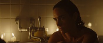 Movie still from “Only the Brave” (2017), directed by Joseph Kosinski – A woman sitting at a sink in a bathroom; Close Up shot, Over the shoulder angle