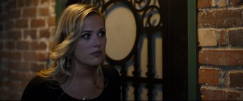 Movie still from “Only the Brave” (2017), directed by Joseph Kosinski – A beautiful blonde woman looking off into the distance; Close Up shot, Over the shoulder angle