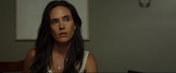 Movie still from “Only the Brave” (2017), directed by Joseph Kosinski – A person with long black hair; Close Up shot, Over the shoulder angle