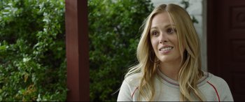 Movie still from “Only the Brave” (2017), directed by Joseph Kosinski – A beautiful blonde woman with long hair; Close Up shot, Over the shoulder angle