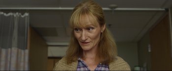 Movie still from “Only the Brave” (2017), directed by Joseph Kosinski – A person with long hair; Close Up shot, Over the shoulder angle