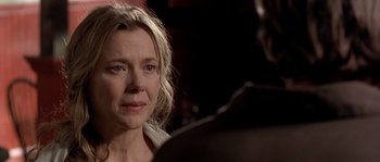 Movie still from “Open Range” (2003), directed by Kevin Costner – A person talking to another person; Close Up shot, Over the shoulder angle