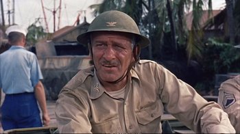 Movie still from “Operation Petticoat” (1959), directed by Blake Edwards – An older man wearing a hat and a uniform; Close Up shot, Low angle
