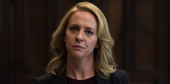 Movie still from “13 Reasons Why” (2017), created by Brian Yorkey – A woman with blonde hair wearing a black jacket; Close Up shot, Low angle