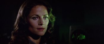 Movie still from “Orca” (1977), directed by Michael Anderson – A woman's face in the dark; Close Up shot, Low angle