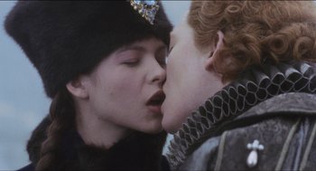 Movie still from “Orlando” (1992), directed by Sally Potter – Two people are kissing each other on the lips; Close Up shot, Over the shoulder angle