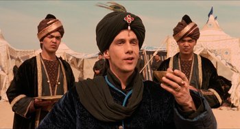 Movie still from “Orlando” (1992), directed by Sally Potter – A man wearing a turban and a black robe; Close Up shot, Low angle