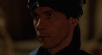 Movie still from “Orlando” (1992), directed by Sally Potter – A person wearing a hat; Close Up shot, Over the shoulder angle