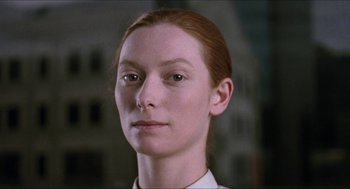 Movie still from “Orlando” (1992), directed by Sally Potter – A person with red hair; Close Up shot, Low angle