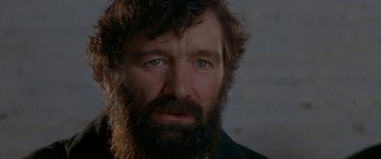 Movie still from “Oscar and Lucinda” (1997), directed by Gillian Armstrong – A person with a beard; Close Up shot, Over the shoulder angle