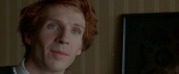 Movie still from “Oscar and Lucinda” (1997), directed by Gillian Armstrong – A man with red hair and blue eyes; Close Up shot, Over the shoulder angle