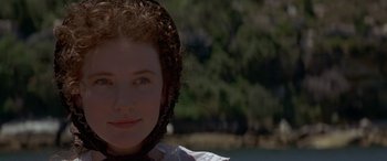 Movie still from “Oscar and Lucinda” (1997), directed by Gillian Armstrong – A person wearing a hat; Close Up shot, High angle