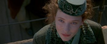Movie still from “Oscar and Lucinda” (1997), directed by Gillian Armstrong – A person wearing a hat; Close Up shot, High angle