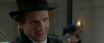 Movie still from “Oscar and Lucinda” (1997), directed by Gillian Armstrong – A person wearing a hat; Close Up shot, Over the shoulder angle