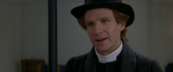 Movie still from “Oscar and Lucinda” (1997), directed by Gillian Armstrong – A person wearing a hat; Close Up shot, Over the shoulder angle