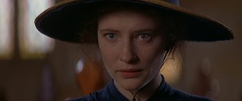Movie still from “Oscar and Lucinda” (1997), directed by Gillian Armstrong – A person wearing a hat; Close Up shot, Over the shoulder angle