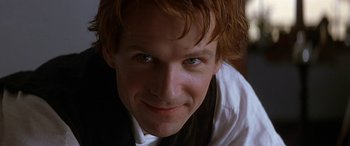 Movie still from “Oscar and Lucinda” (1997), directed by Gillian Armstrong – A man with red hair and blue eyes; Close Up shot, Low angle