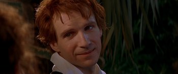 Movie still from “Oscar and Lucinda” (1997), directed by Gillian Armstrong – A person wearing a white shirt; Close Up shot, Over the shoulder angle