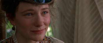 Movie still from “Oscar and Lucinda” (1997), directed by Gillian Armstrong – A woman's face with blue eyes; Close Up shot, Over the shoulder angle