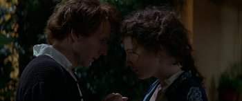 Movie still from “Oscar and Lucinda” (1997), directed by Gillian Armstrong – A man and a woman face to face in the dark; Close Up shot, Overhead angle
