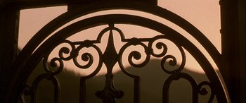 Movie still from “Oscar and Lucinda” (1997), directed by Gillian Armstrong – View of a wrought iron fence; Extreme Close Up shot, Low angle