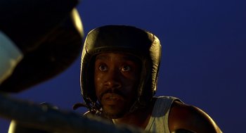 Movie still from “Out of Sight” (1998), directed by Steven Soderbergh – A person with a helmet on; Close Up shot, Low angle