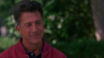 Movie still from “Outbreak” (1995), directed by Wolfgang Petersen – A person wearing a red jacket; Close Up shot, Over the shoulder angle