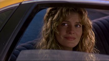 Movie still from “Outbreak” (1995), directed by Wolfgang Petersen – A person in a car looking out the window; Close Up shot, Low angle