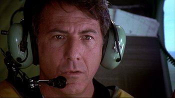 Movie still from “Outbreak” (1995), directed by Wolfgang Petersen – A person wearing a headset; Close Up shot, Low angle