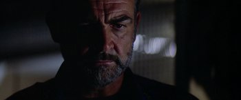 Movie still from “Outland” (1981), directed by Peter Hyams – A person with a beard; Close Up shot, Low angle