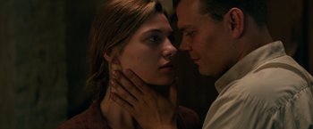 Movie still from “Overlord” (2018), directed by Julius Avery – A man and a woman face to face in the dark; Close Up shot, Low angle