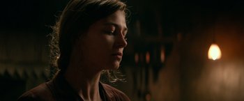 Movie still from “Overlord” (2018), directed by Julius Avery – A person with her eyes closed; Close Up shot, Over the shoulder angle