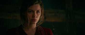 Movie still from “Overlord” (2018), directed by Julius Avery – A person wearing a red shirt; Close Up shot, Over the shoulder angle